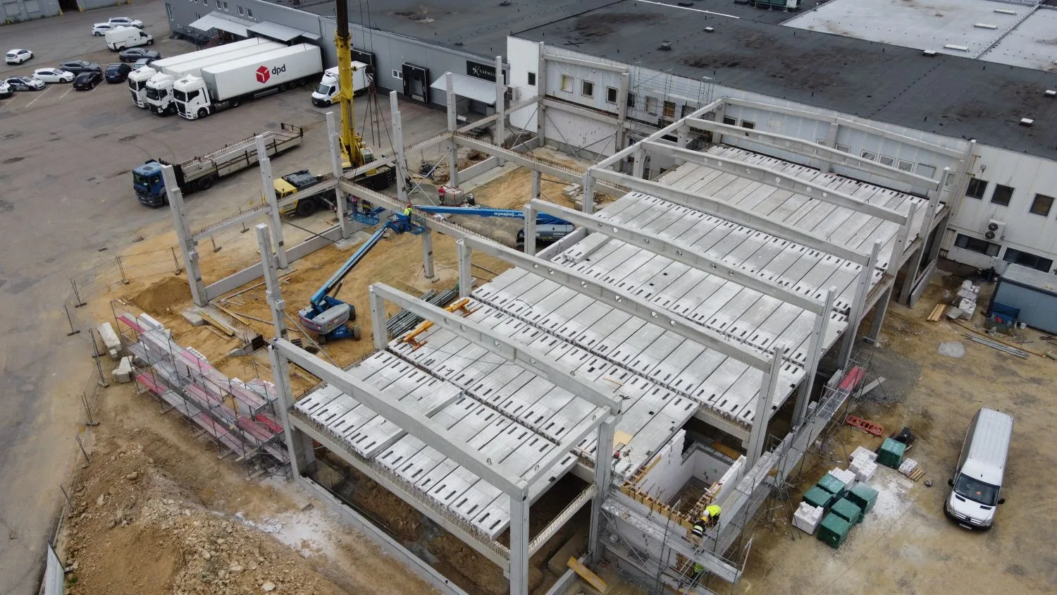 Prace konstrukcyjne przy budowie budynku produkcyjno-usługowego dla Karmello, generalny wykonawca VSYSTEM